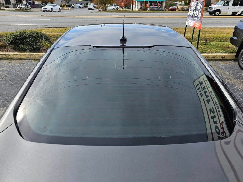 Clean, tinted back window of a vehicle